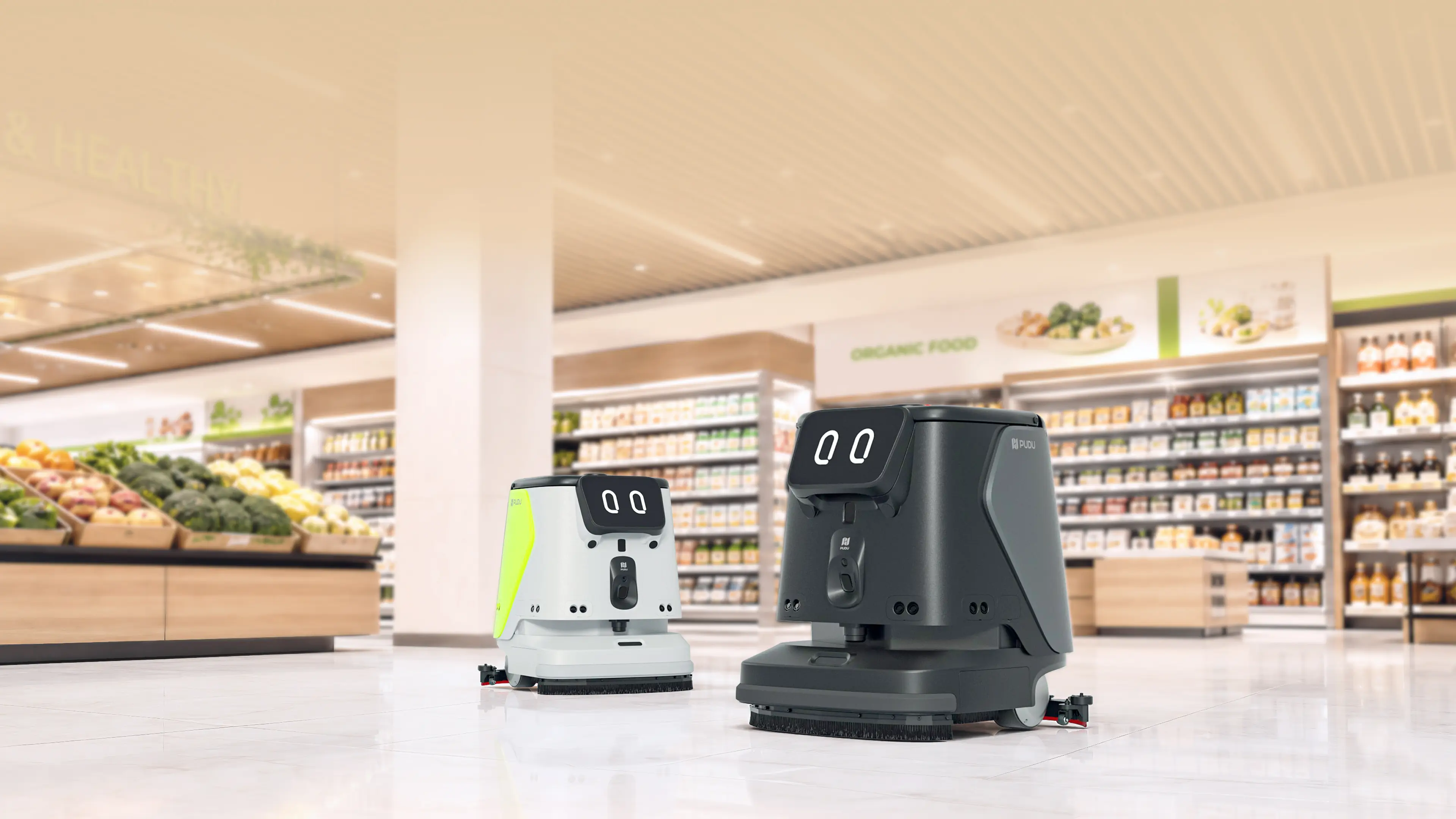 PUDU CC1 Pro Disc Green Edition and Black Edition cleaning robots in a supermarket